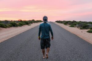 a person walking on the road